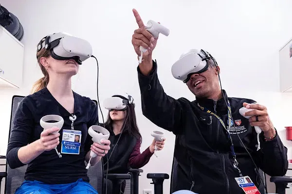 a group of people wearing vr headsets