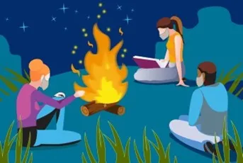 Teens sit around a campfire