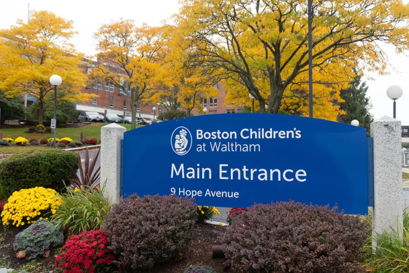 Sign at exterior of Boston Children's Waltham welcoming patients