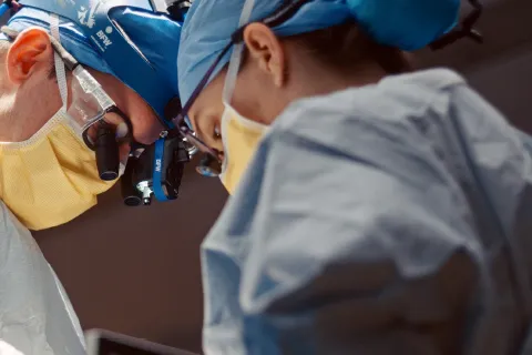 Surgeons at work in operating room